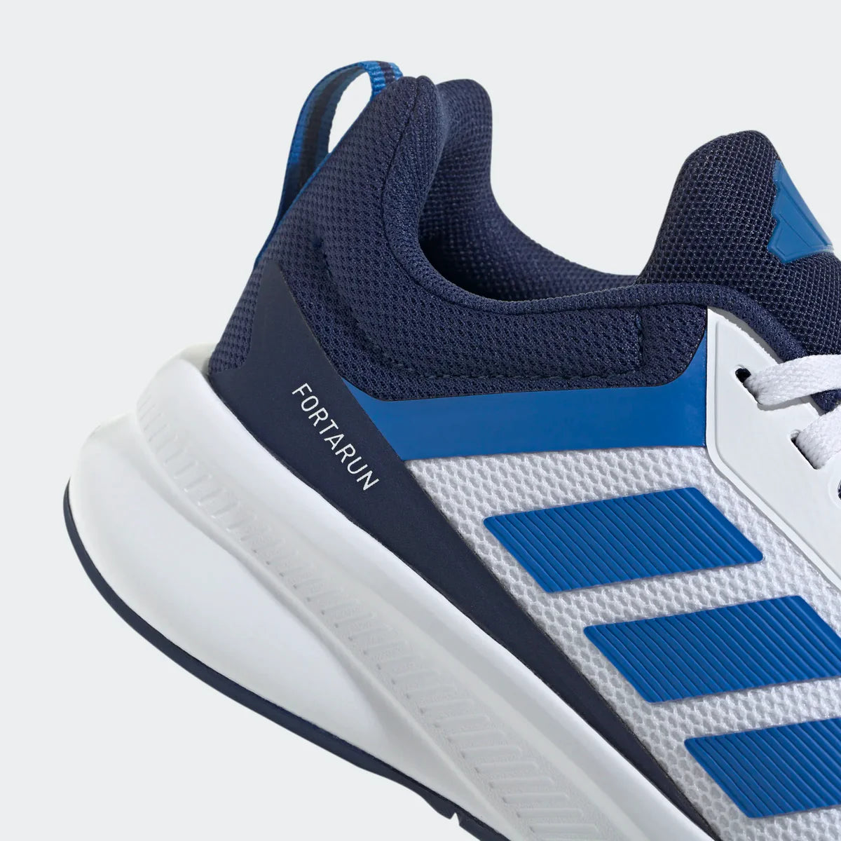 Youth FortaRun 4.0 Trainers (White/Navy/Royal Blue)